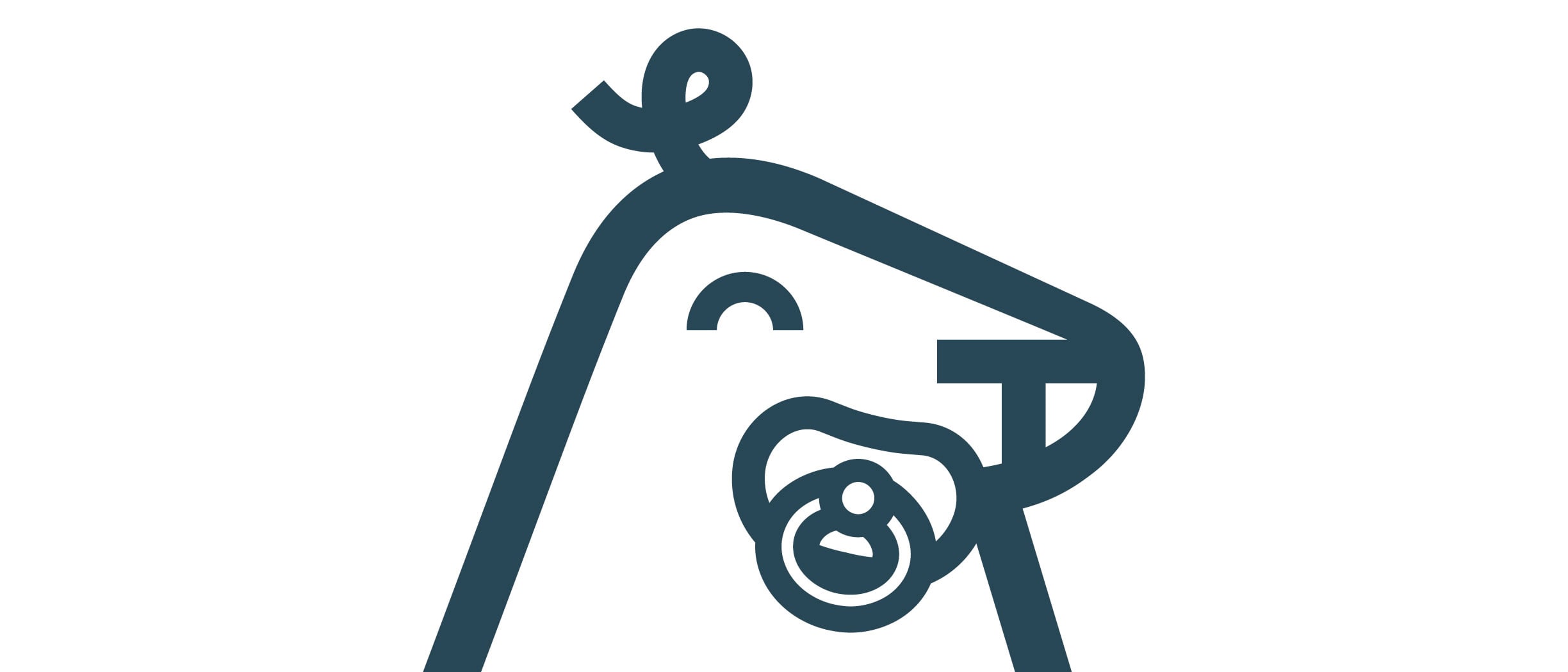 Vauva-Harri, jolla on tutti suussa ja pieni hiuskiehkura päälaella.