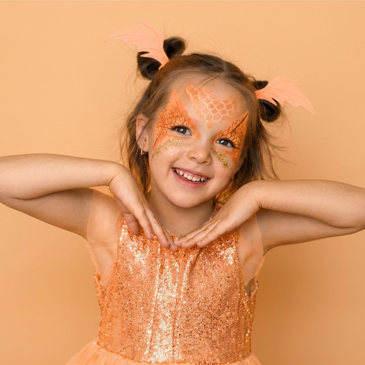 A child with face paint enjoying the Spanish Festival children's programme.